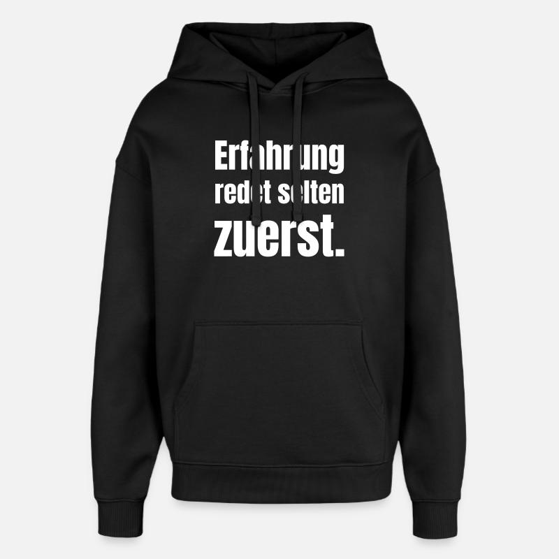 Experience rarely speaks first - Oversized Unisex Hoodie by Stanley/Stella - black