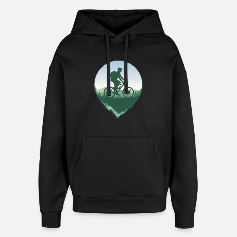 Mountainbiker vor Wald und Bergen - Oversized Unisex Hoodie von Stanley/Stella - Schwarz