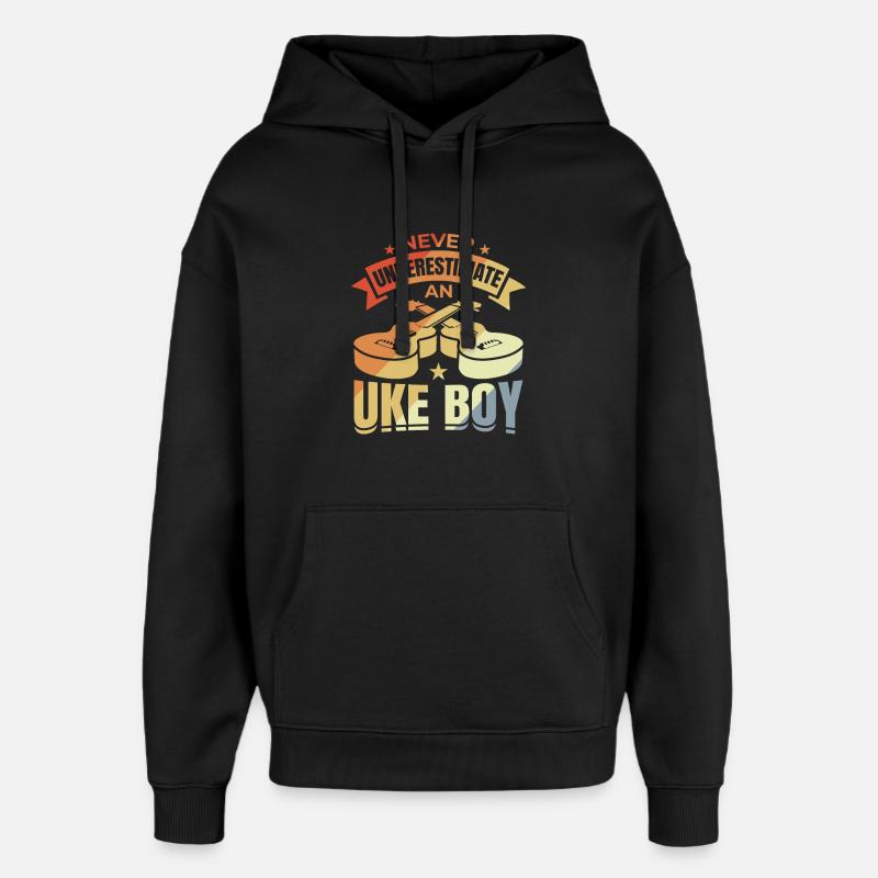 Ne sous-estimez jamais un garçon ukulélé - Sweat à capuche unisexe Stanley/Stella Oversized - noir