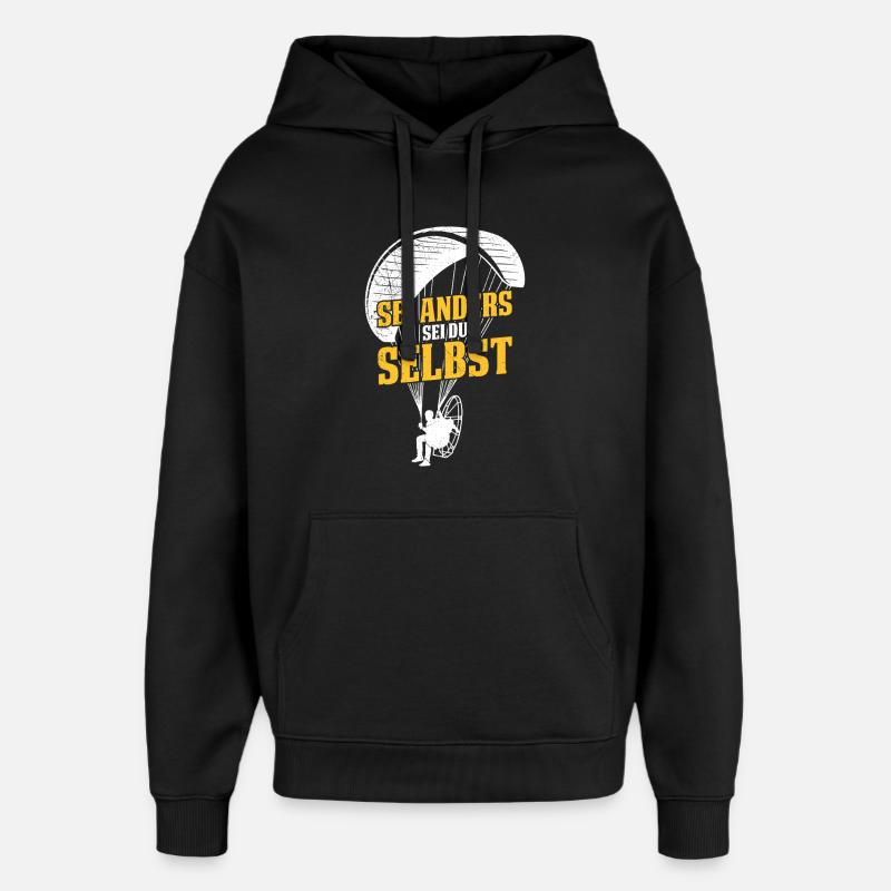 Paraglider BE DIFFERENT, BE YOURSELF Fun - Oversized Unisex Hoodie by Stanley/Stella - black