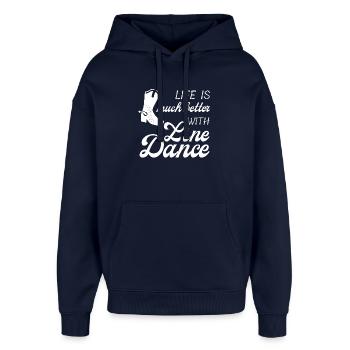 Geschenkidee: Live is much better with Line Dance - Oversized Unisex Hoodie von Stanley/Stella - Navy - Vorne - AI Model Female 172 light (172cm) & AI Model Male 185 light (185cm)