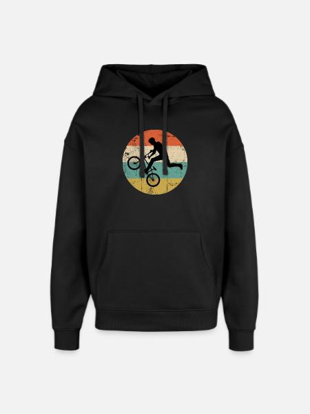 BMX Stunt Silhouette on Retro Stripes - Oversized Unisex Hoodie by Stanley/Stella - black