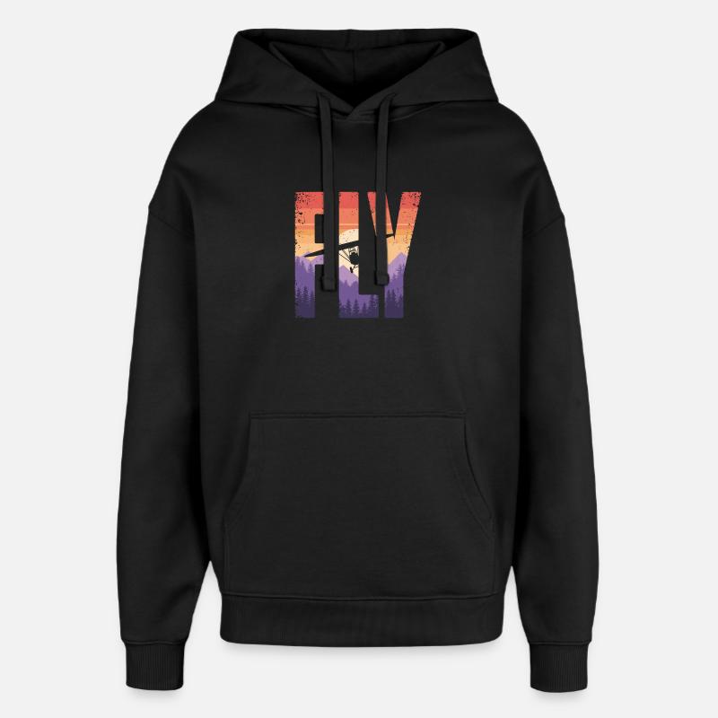 Vol vers le coucher du soleil - Sweat à capuche unisexe Stanley/Stella Oversized - noir