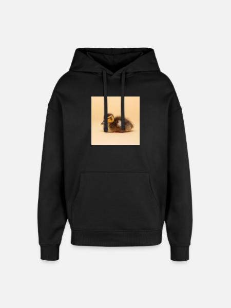 Poussin doré sur fond crème - Sweat à capuche unisexe Stanley/Stella Oversized - noir