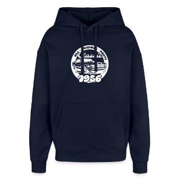 70. Geburtstag - Klassiker Musclecar 04/1956 - Oversized Unisex Hoodie von Stanley/Stella - Navy - Vorne - AI Model Female 172 light (172cm) & AI Model Male 185 light (185cm)