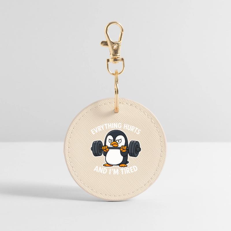 Grumpy Penguin Lifting Weights Porte-clés rond