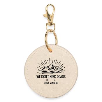 We Don't Need Roads. Ultra Runners - Round Keyring - oyster - Front