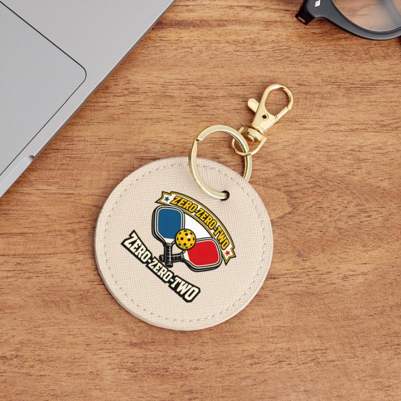 Zero-Zero-Two Paddle Ball Emblem Round Keyring