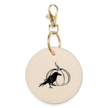 Raven with Halloween pumpkin in autumn - Round Keyring - oyster - Front