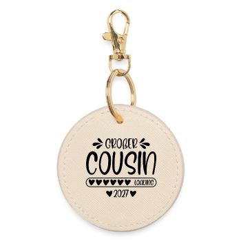 Big Cousin 2027 loading - Round Keyring - oyster - Front