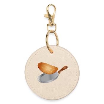 goldbraunen Pfannkuchen in der Pfanne wenden - Runder Schlüsselanhänger - Auster - Vorne