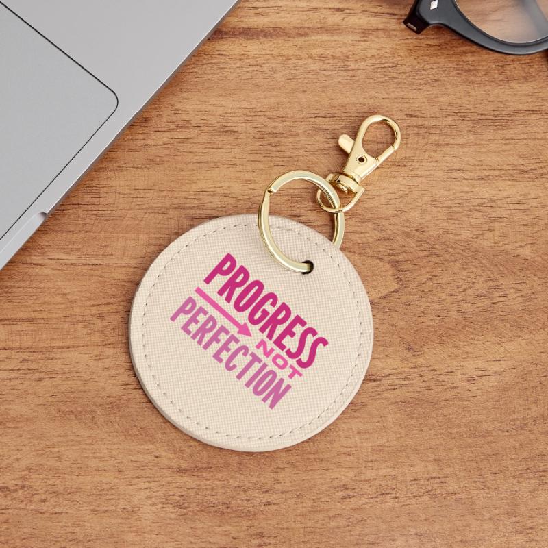 Le progrès, pas la perfection Le progrès compte Porte-clés rond