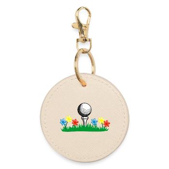 Golfstock und Ball auf Rasen mit Blumen - Runder Schlüsselanhänger - Auster - Vorne