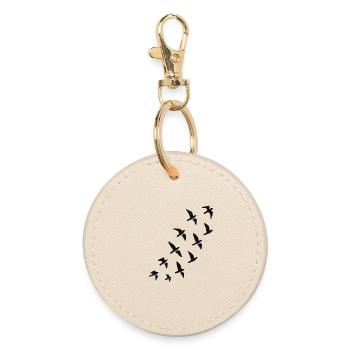 Volée d’oiseaux silhouette sur fond noir - Porte-clés rond - huître - Devant