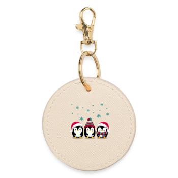 Three penguins with Christmas hats - Round Keyring - oyster - Front