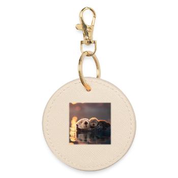 Sea otters and baby otters on the water - Round Keyring - oyster - Front