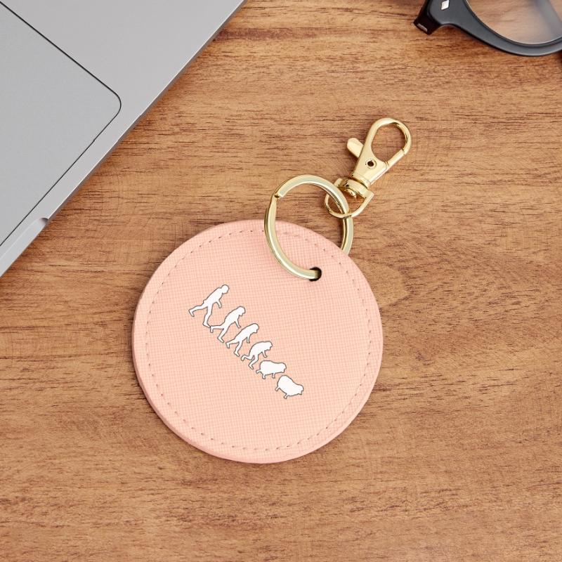 Evolution to Sheep: Herd Mindset Round Keyring