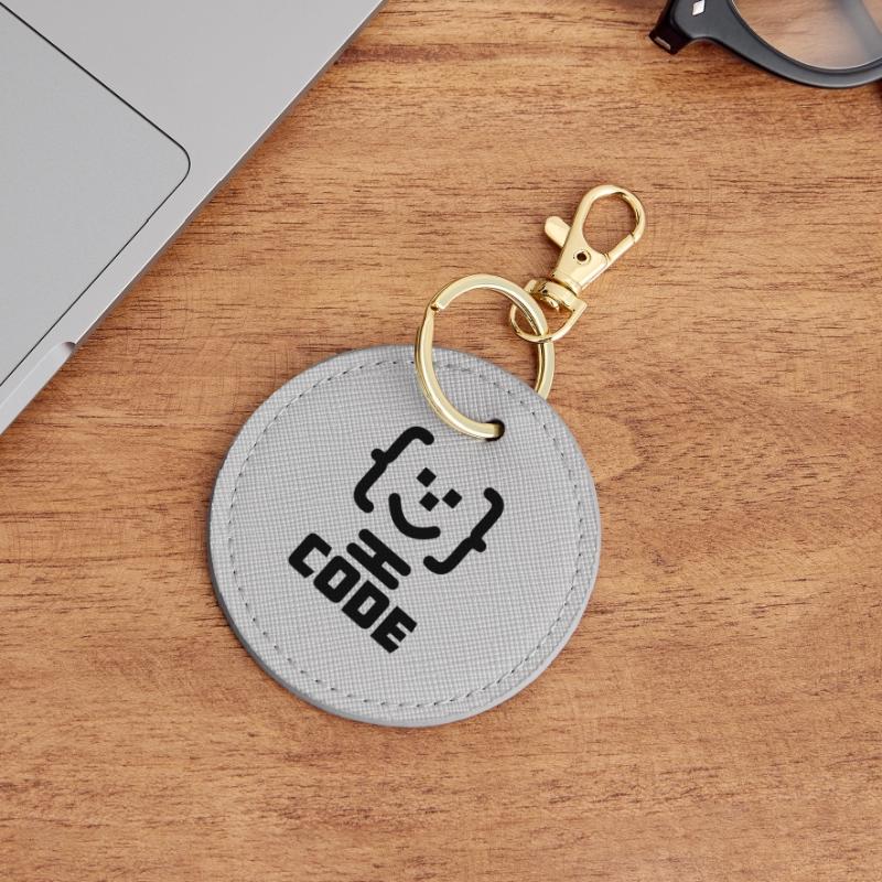 Logo du code du programmeur principal avec texte CODE Porte-clés rond