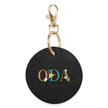 ODA name decorated with flowers - Round Keyring - black - Front