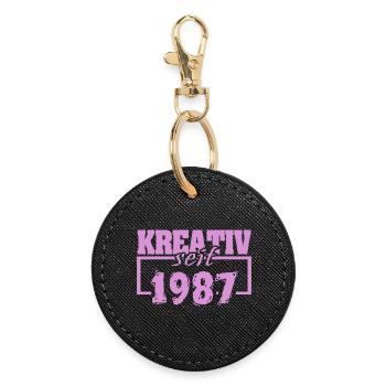 Création 1987 - Porte-clés rond - noir - Devant