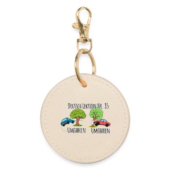 German Lesson - Driving around a tree vs. driving around a tree! - Round Keyring - oyster - Front