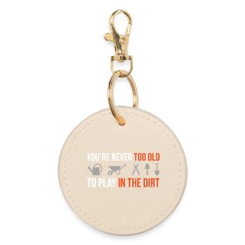 Never Too Old to Play in the Dirt – Gärtner Design - Round Keyring - oyster - Front