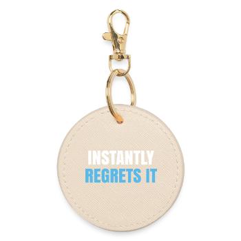 Instantly Regrets It - Round Keyring - oyster - Front