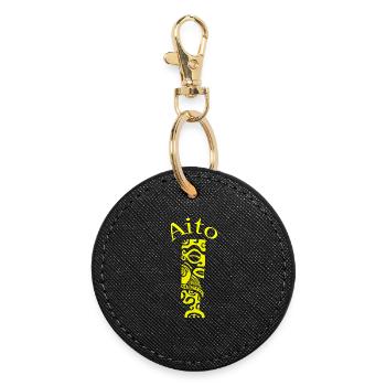 TIKI AITO "YELLOW" - Runder Schlüsselanhänger - Schwarz - Vorne