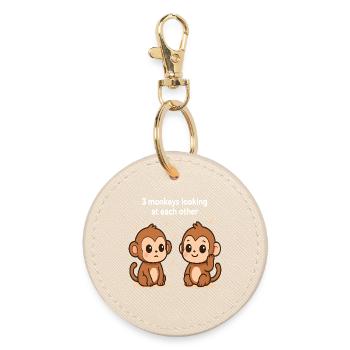 Playful monkeys with eye contact - Round Keyring - oyster - Front