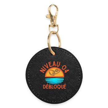 Level 04 Unlocked, a creative and joyful touch - Round Keyring - black - Front