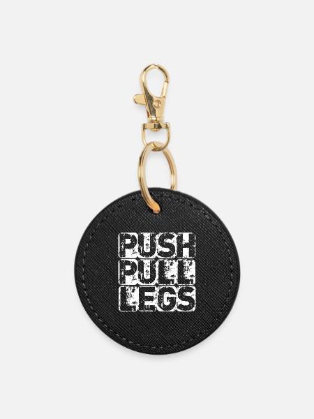 PUSH PULL LEGS - Runder Schlüsselanhänger - Schwarz