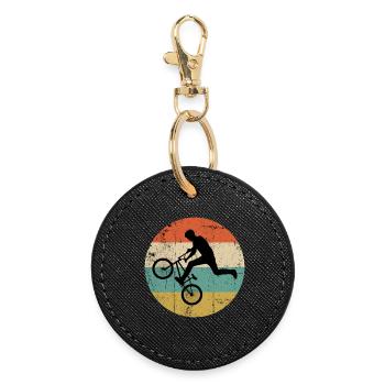 BMX Stunt Silhouette auf Retro Streifen - Runder Schlüsselanhänger - Schwarz - Vorne
