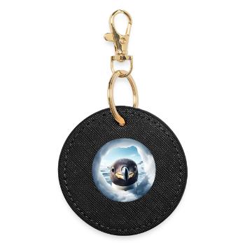 Pingouin regarde à travers le trou, paysage de neige - Porte-clés rond - noir - Devant