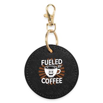 Fueled by Coffee – lächelnde Kaffeetasse - Runder Schlüsselanhänger - Schwarz - Vorne