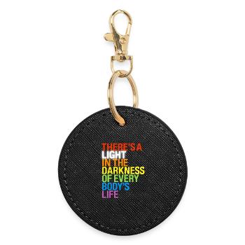 There's a light / Es gibt ein Licht in Dunkeln - Round Keyring - black - Front