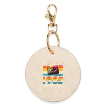 Cassette du 40e anniversaire, octobre 1985 - Porte-clés rond - huître - Devant