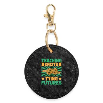 Chef scout enseignant les nœuds scout - Porte-clés rond - noir - Devant