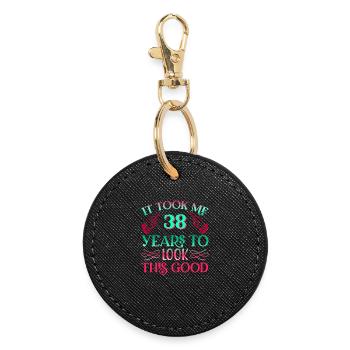 It took 38 years to look so good - Round Keyring - black - Front