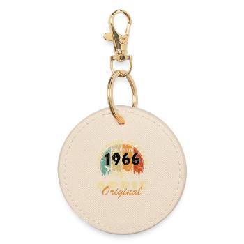 April 1966 - Round Keyring - oyster - Front