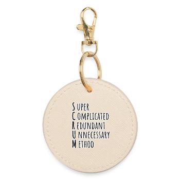 SCRUM Master has agilely developed the Daily Backlog Refinement - Round Keyring - oyster - Front