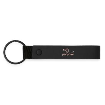 Calm is rebellion. Soft Life Self Care - Matte Pu Keyring - black - Front