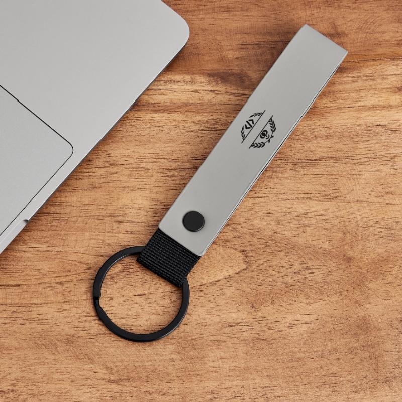 Code logo et code smiley dans une couronne de laurier Porte-clés en PU mat
