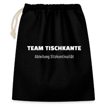 Team Tischkante. Abteilung Sitzkontinuität. - Geschenkbeutel aus Baumwolle (40 x 50 cm) - Schwarz - Vorne