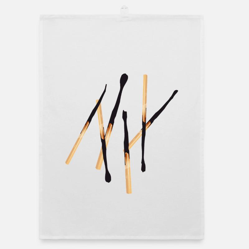 Des allumettes brûlées dans une configuration simple Torchon bio