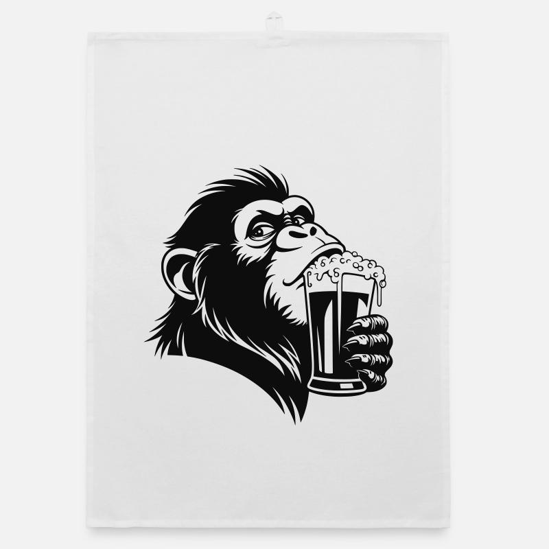 Singe drôle boit une boisson mousseuse Torchon bio