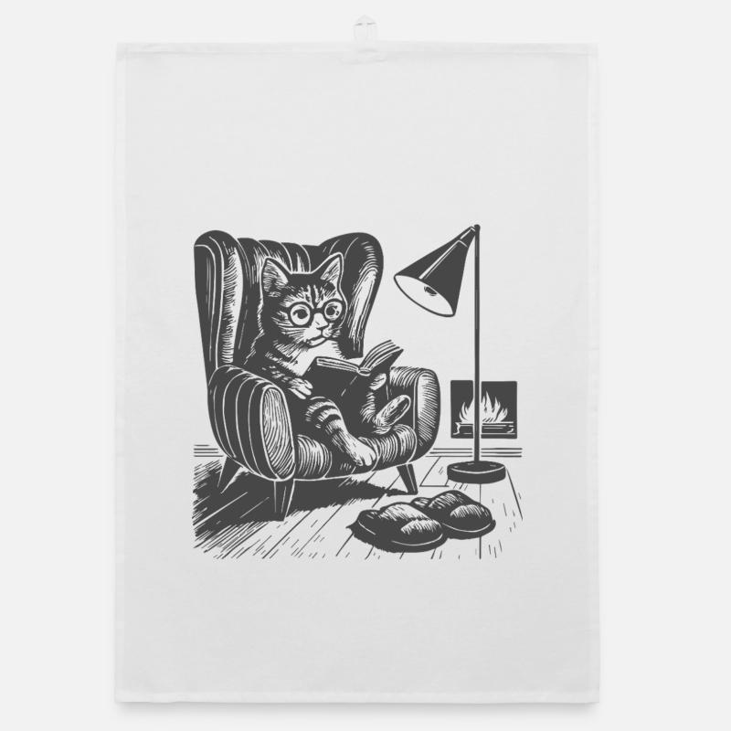 Chat dans le salon en train de lire Torchon bio