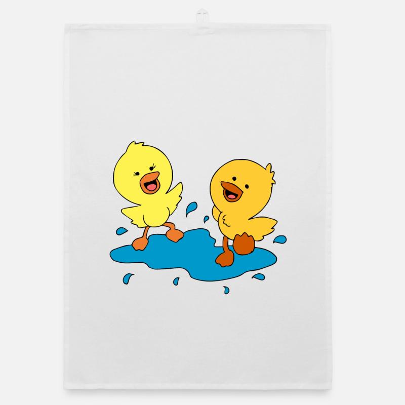 canetons doux éclaboussures dans une flaque d'eau Torchon bio