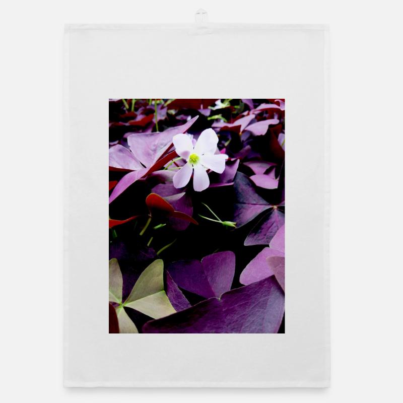 Fleur blanche sur feuillage violet Torchon bio