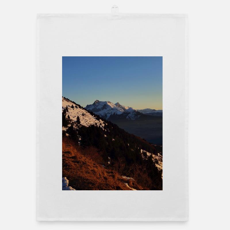 Coucher de soleil sur sommets enneigés Torchon bio