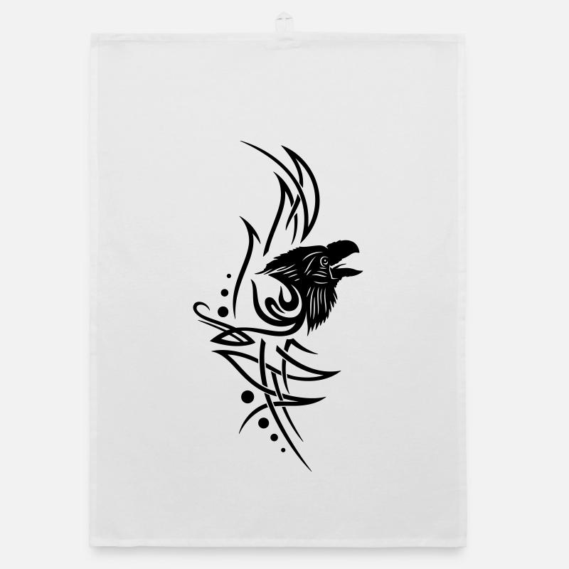 Tatouage avec tête de corbeau. Torchon bio
